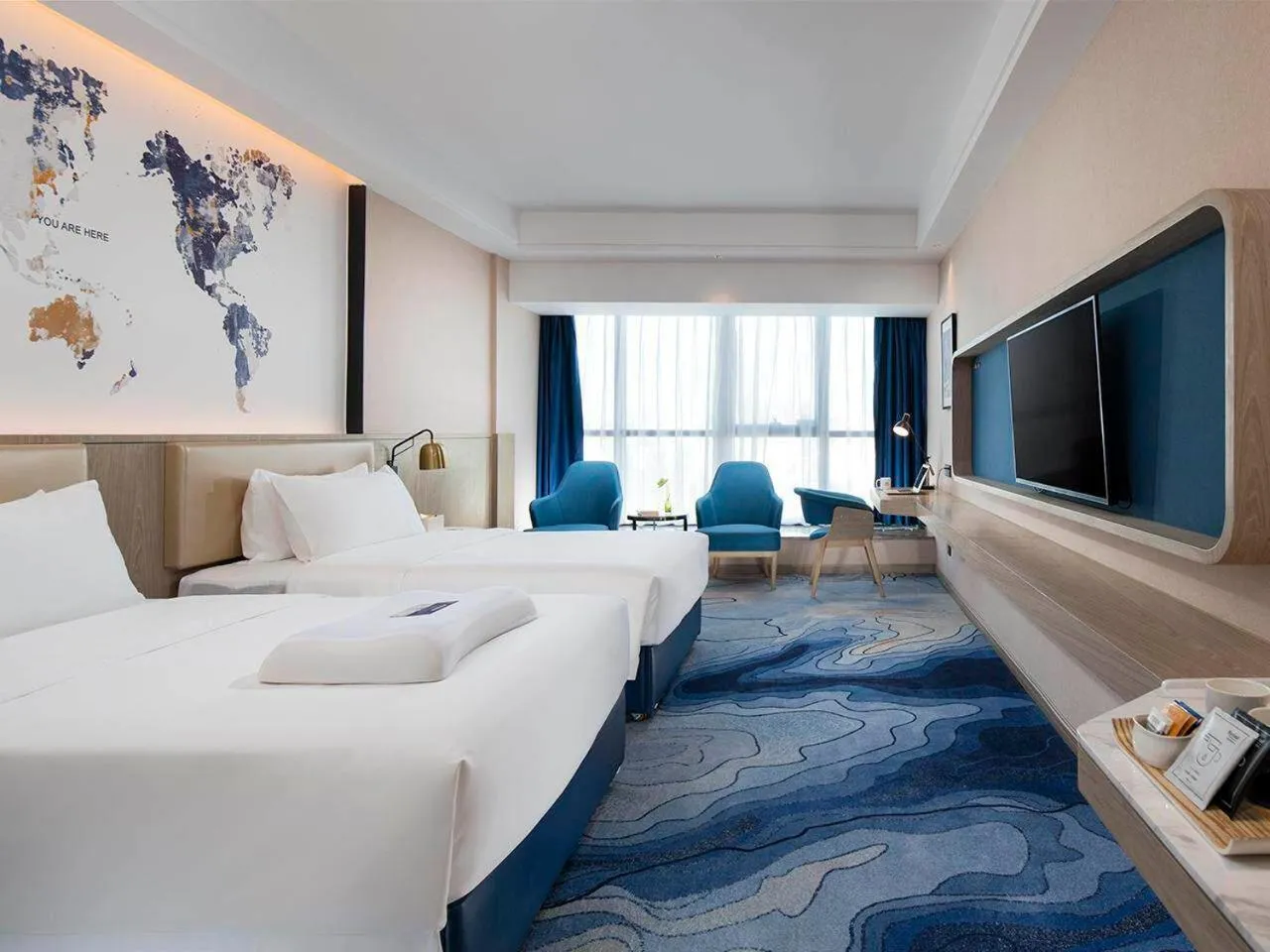 Bed in Kyriad Marvelous Hotel Shenzhen Longhua District Qinghu Subway Station