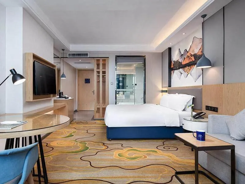 Bed in Kyriad Marvelous Hotel Shenzhen North Railway Station Yousong