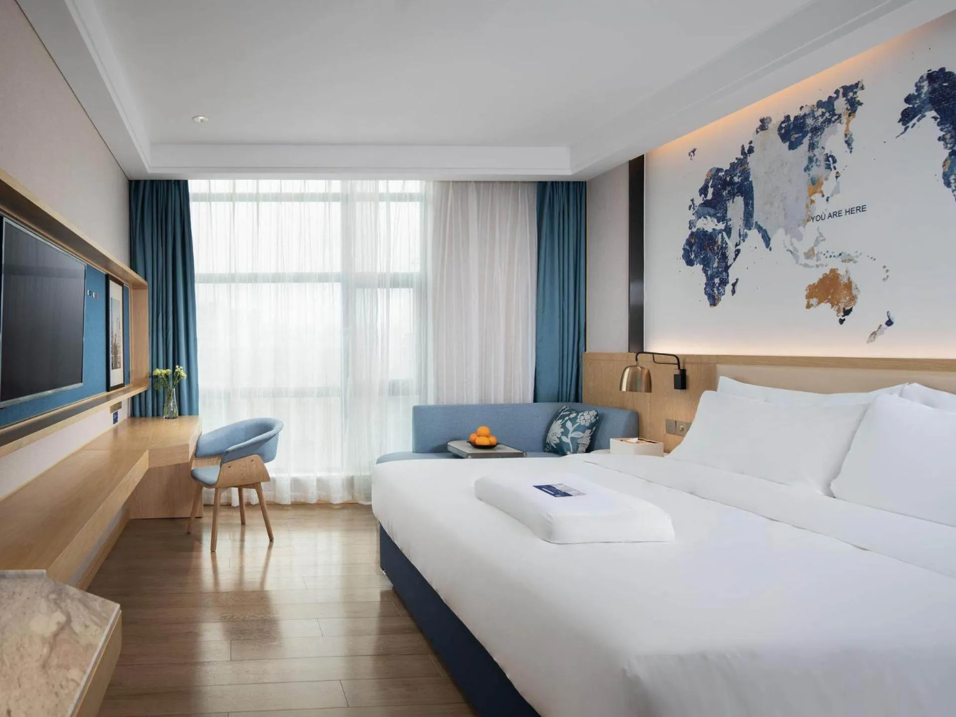 Bed in Kyriad Marvelous Hotel Shenzhen Longhua Dalang Business Center