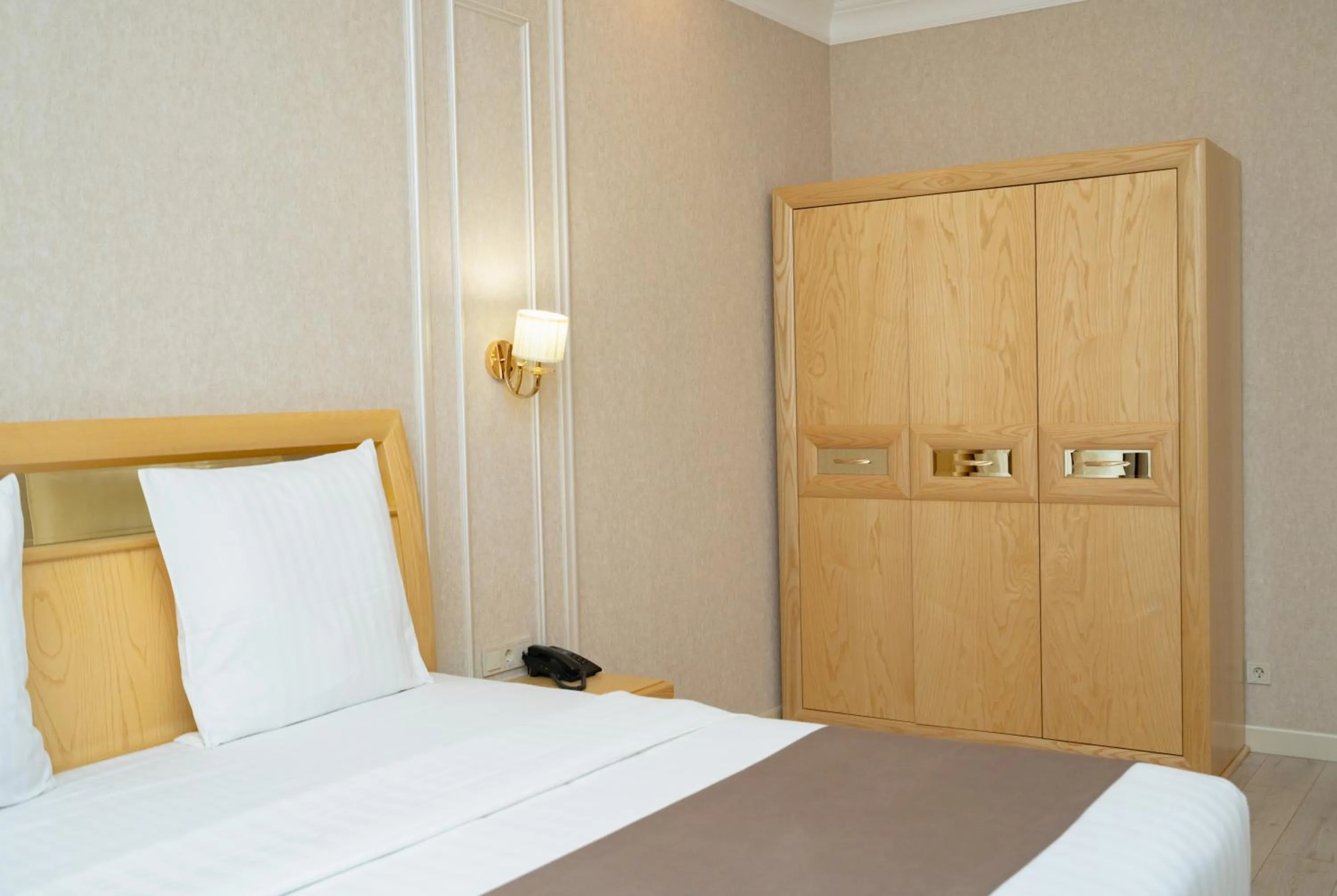 Bed in Al Anvar Halal Hotel by HotelPro group