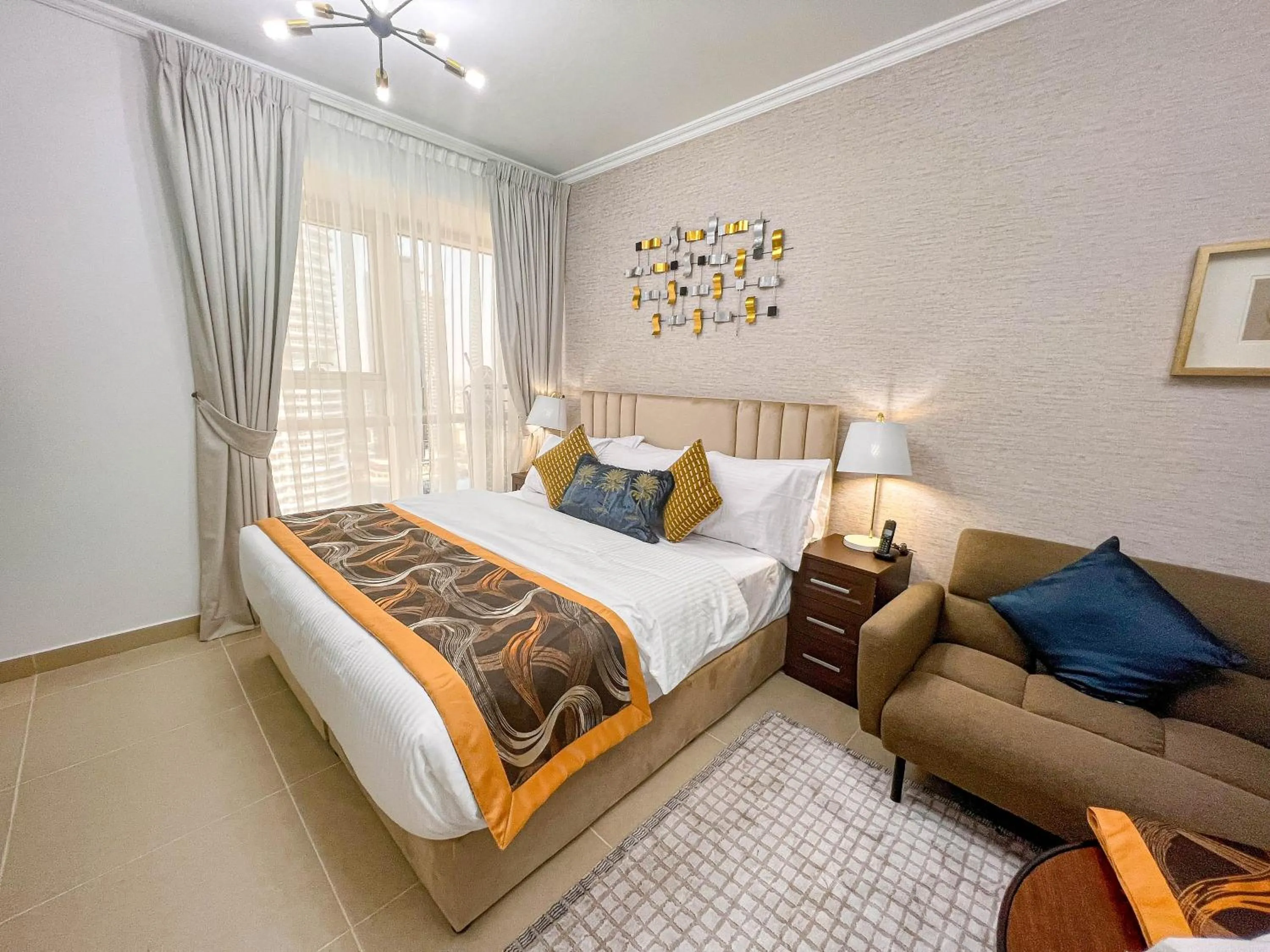 Bed in Cosmos Living Luxurious Studio Near Metro