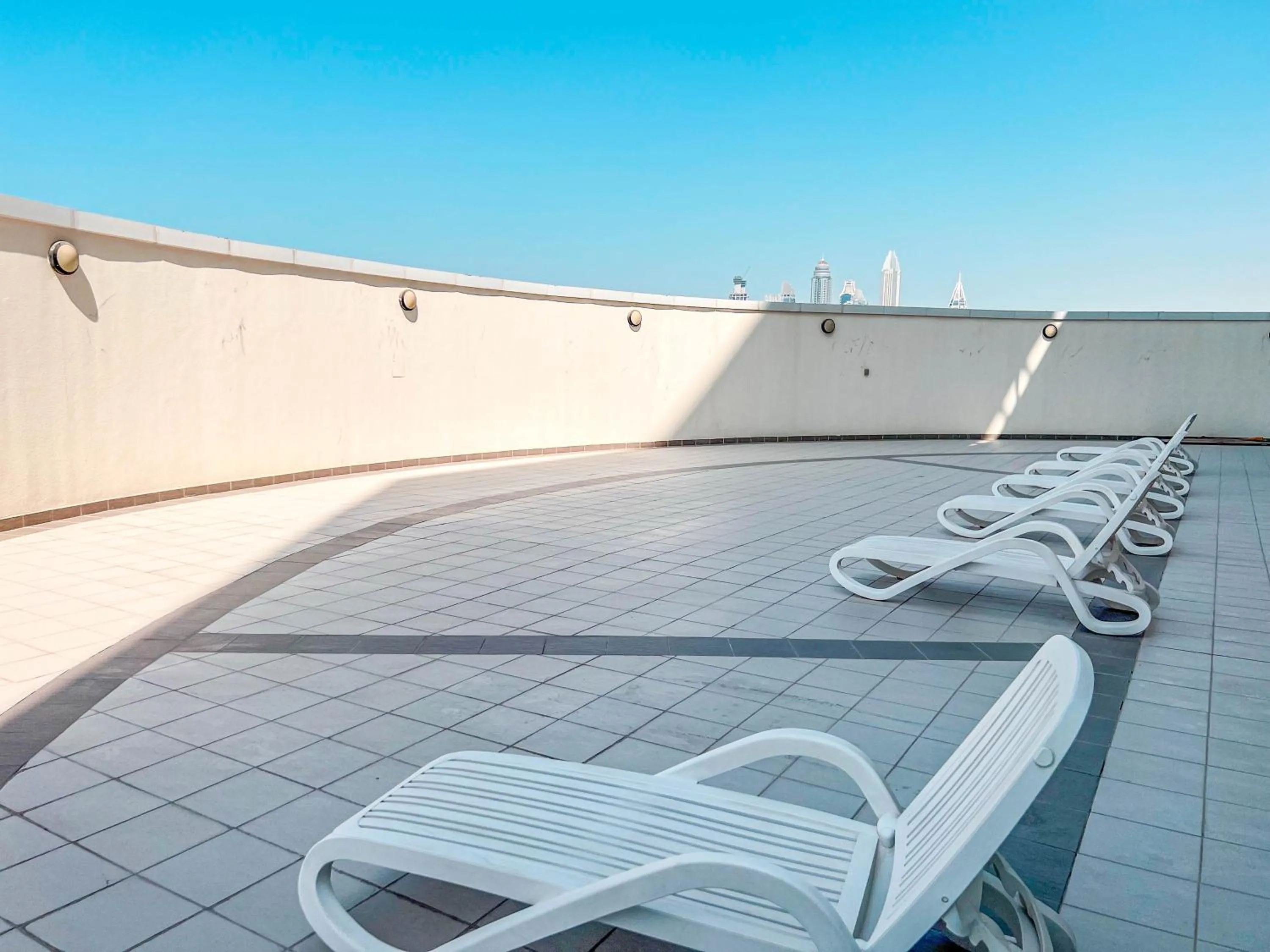 sunbed in Cosmos Living Luxurious Studio Near Metro