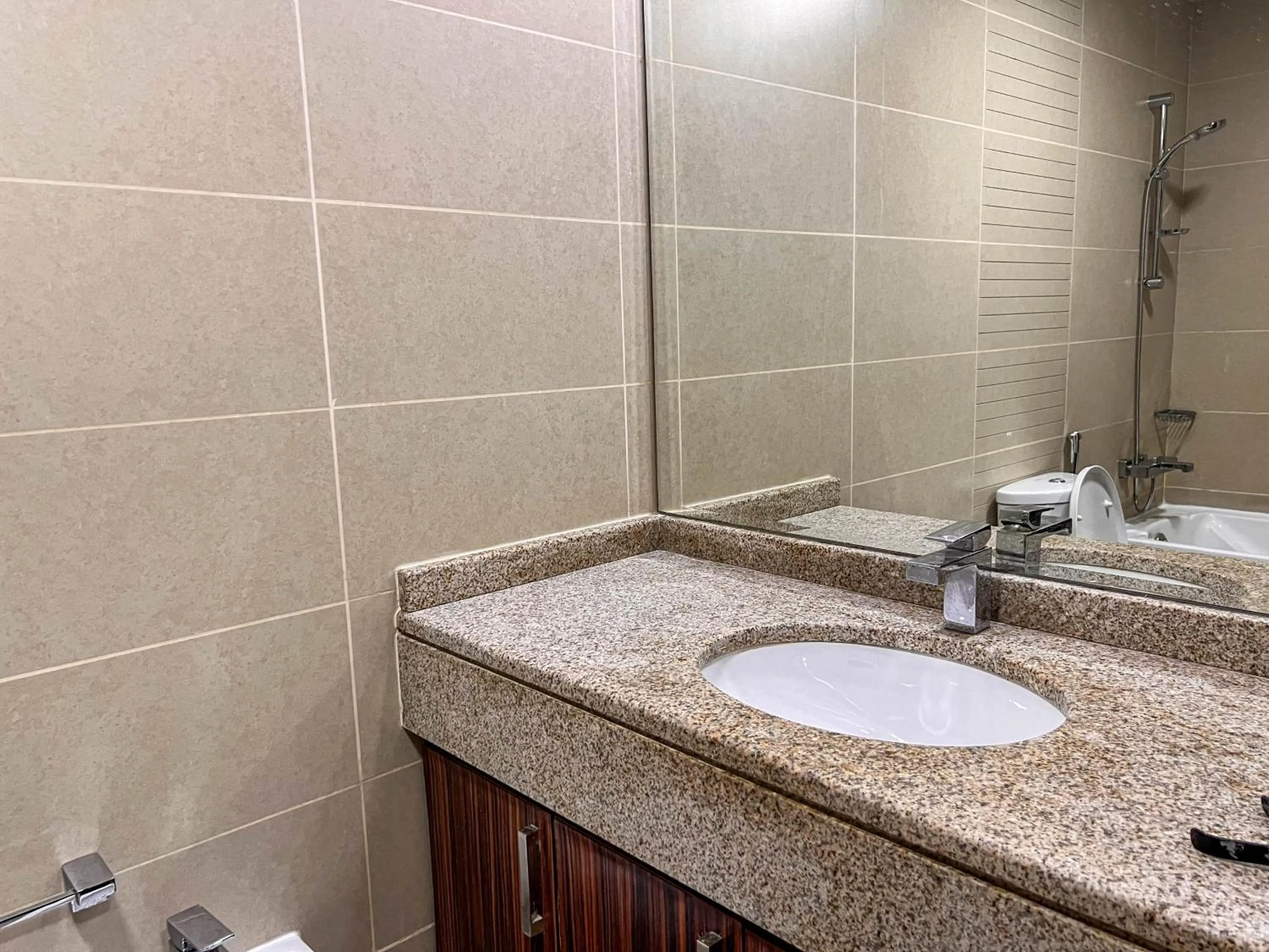 Bathroom in Cosmos Living Luxurious Studio Near Metro