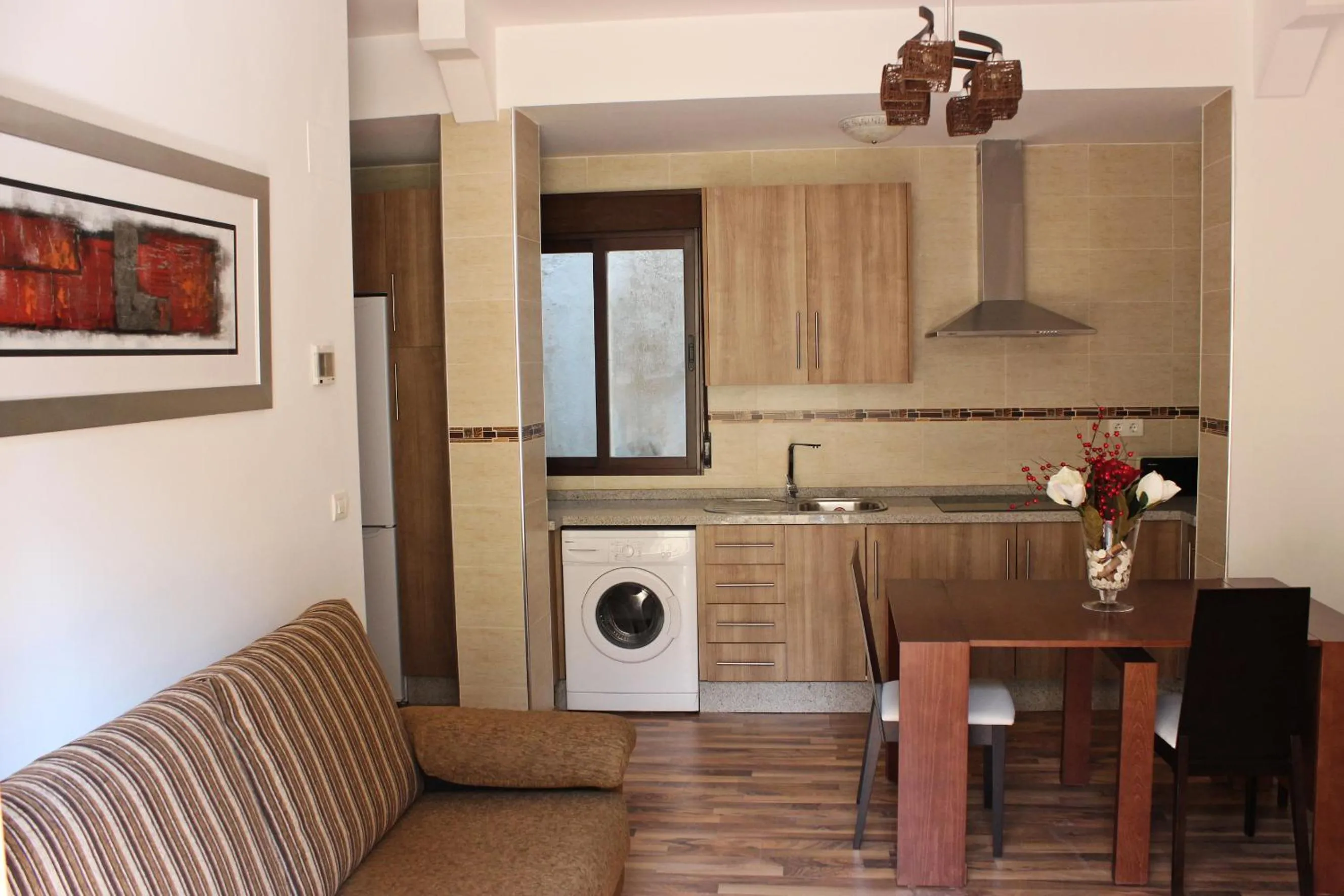 Kitchen or kitchenette in Apartamentos Casa de la Lonja