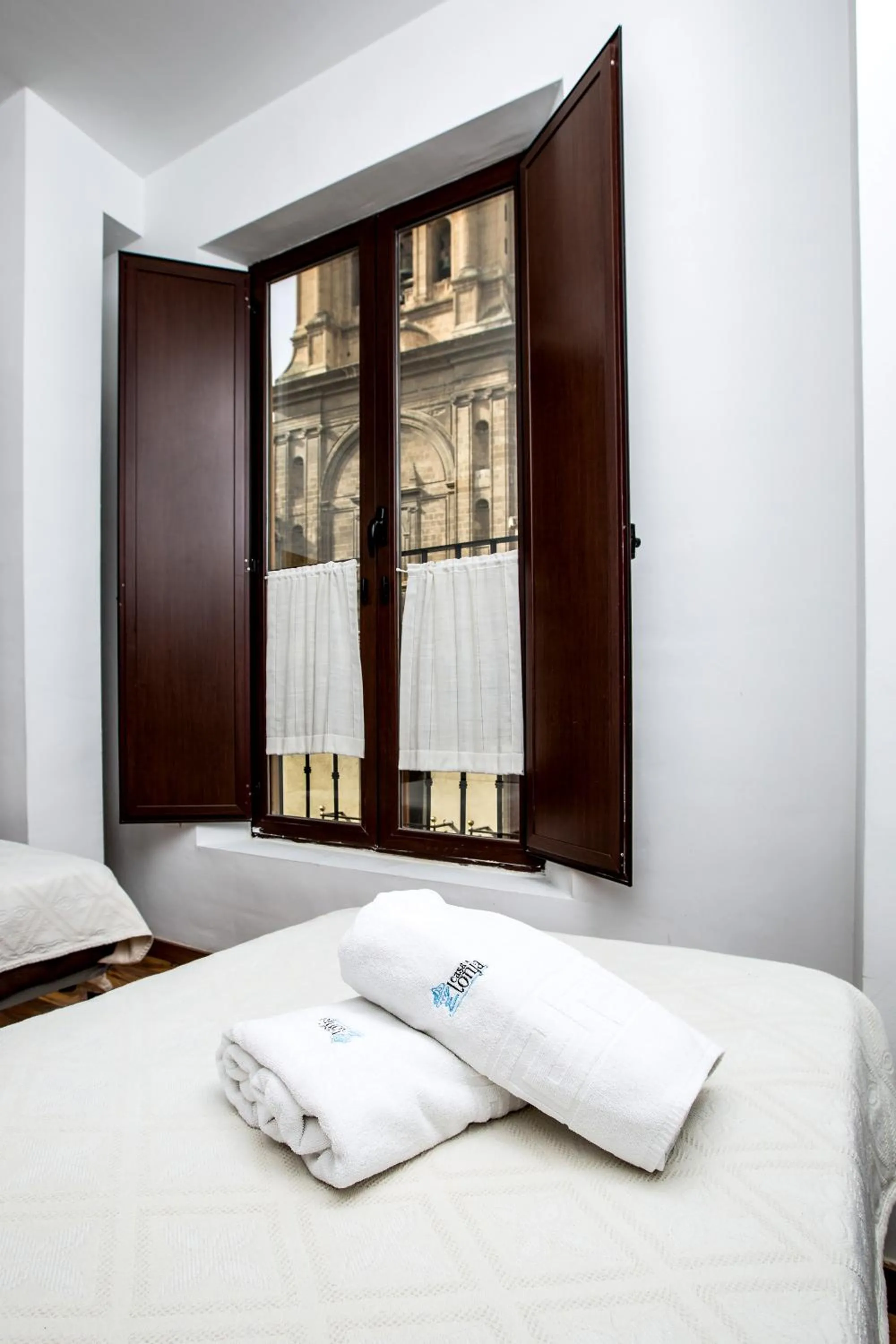 Bed in Apartamentos Casa de la Lonja