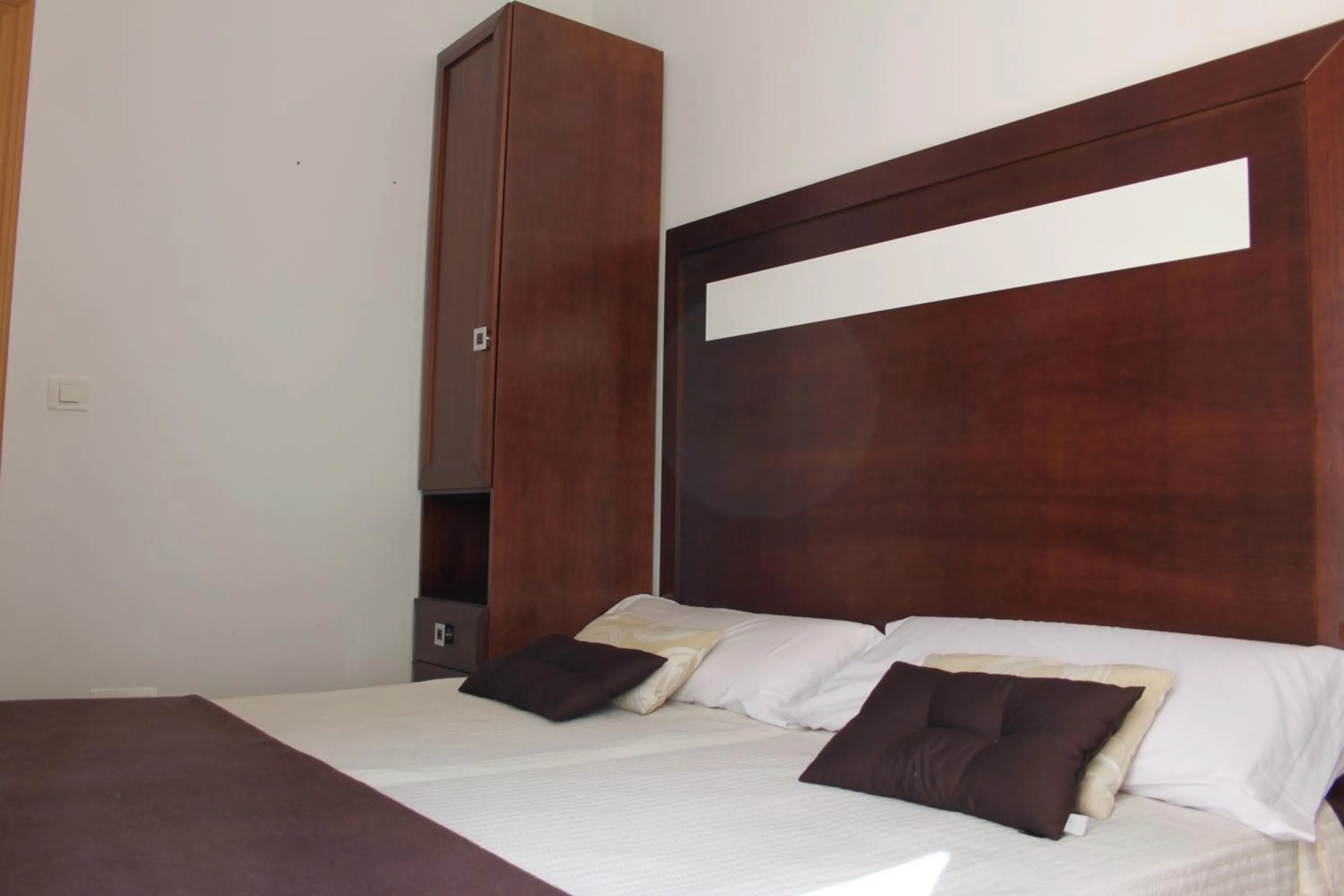 Bed in Apartamentos Casa de la Lonja