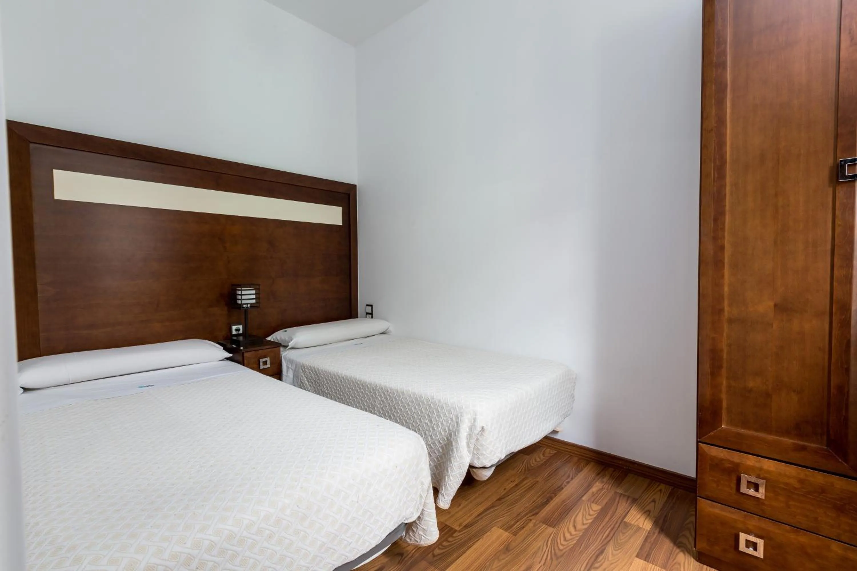 Bed in Apartamentos Casa de la Lonja