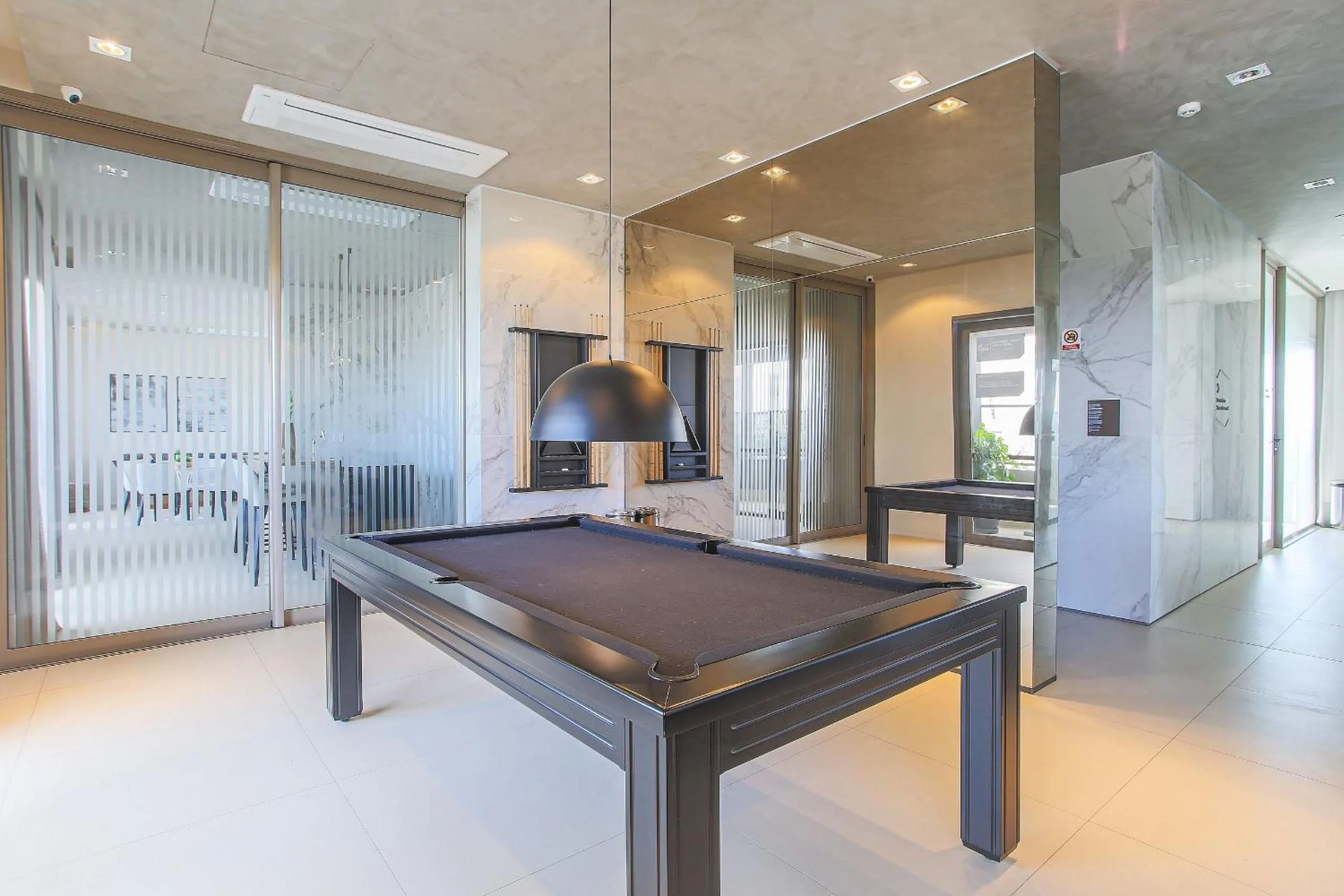 Seating area in DSG Itaim by Conviva