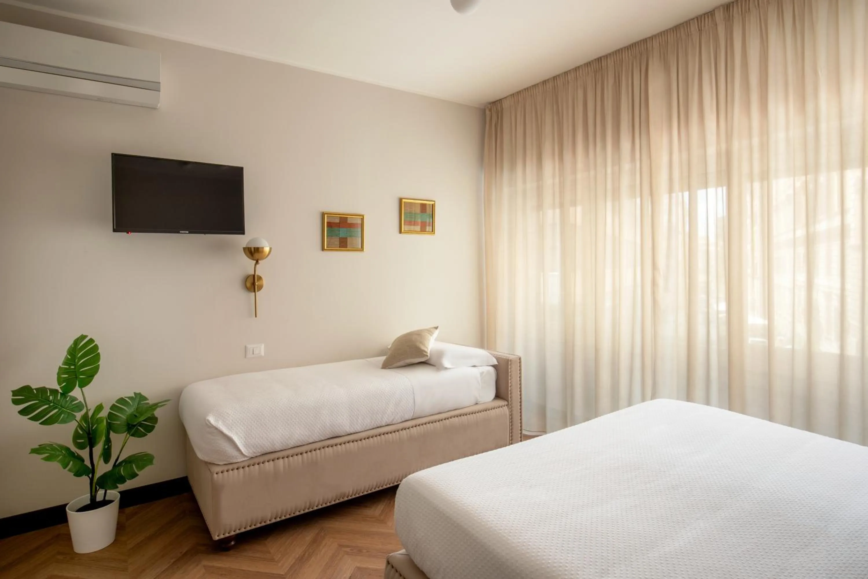 Bed in Daplace - Gran Torino Suites