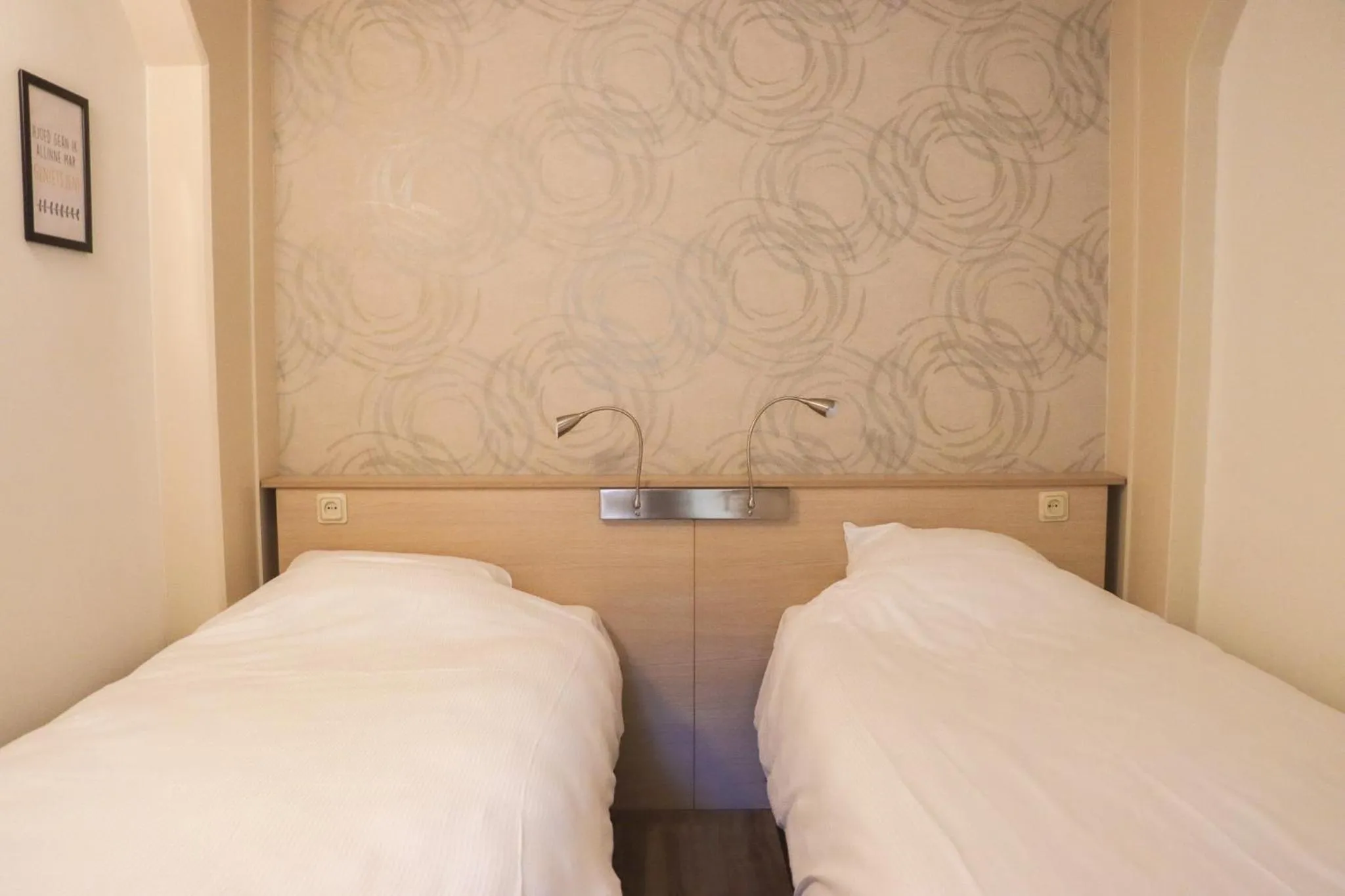 Bed in Hotel Almenum - het sfeervolle stadslogement -