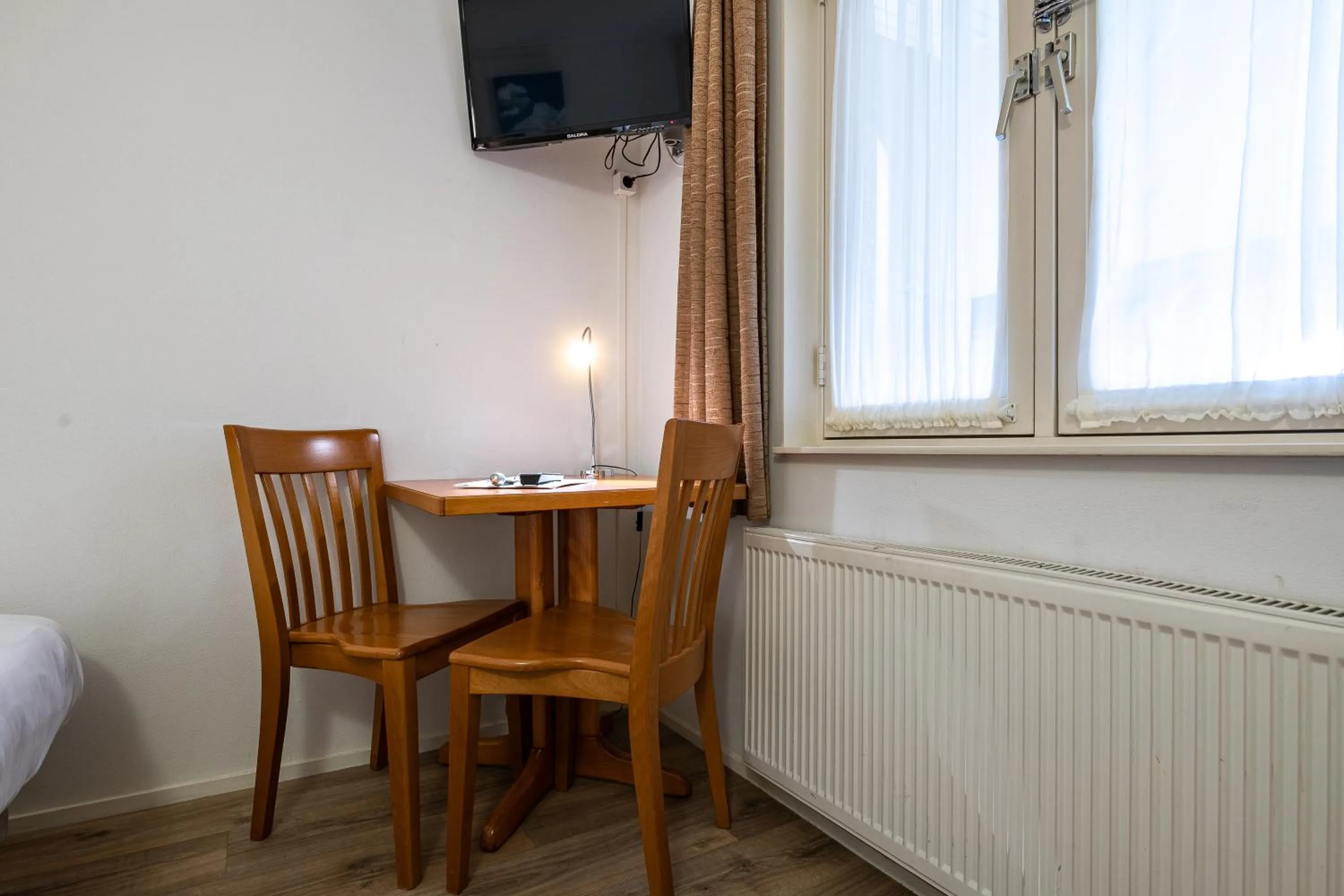Seating area in Hotel Almenum - het sfeervolle stadslogement -