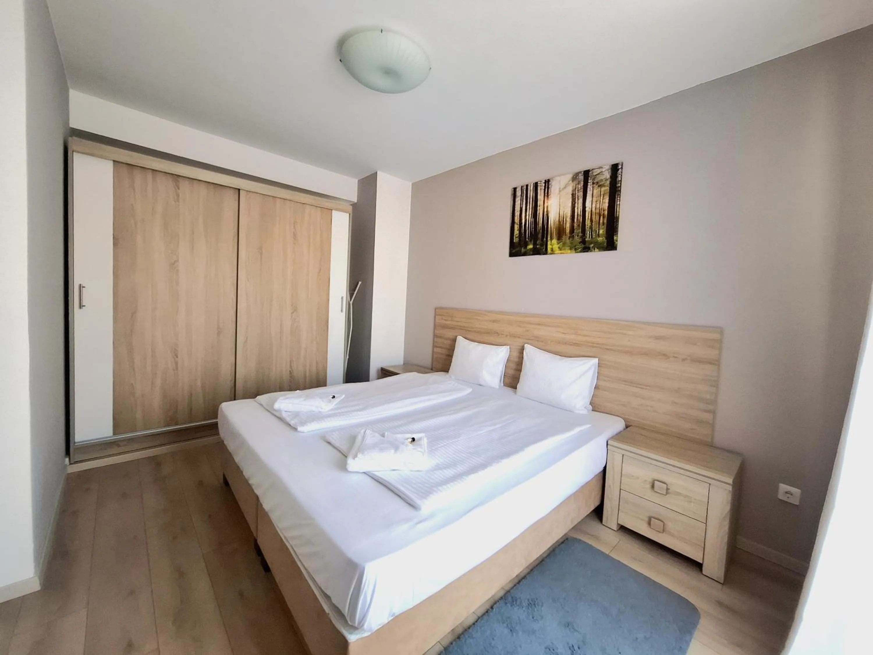 Bed in Maple Tree Budget Apartments