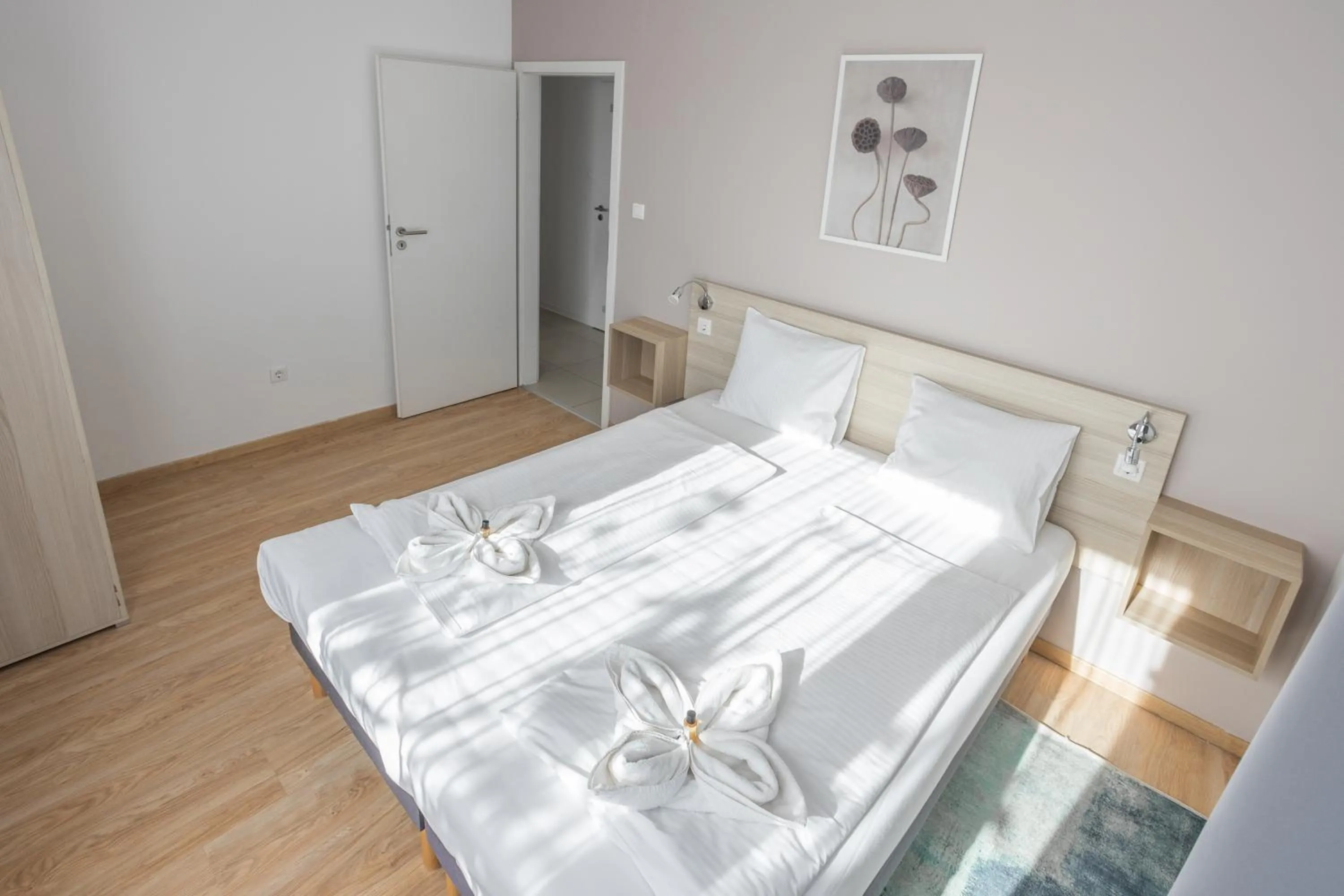 Bed in Maple Tree Budget Apartments