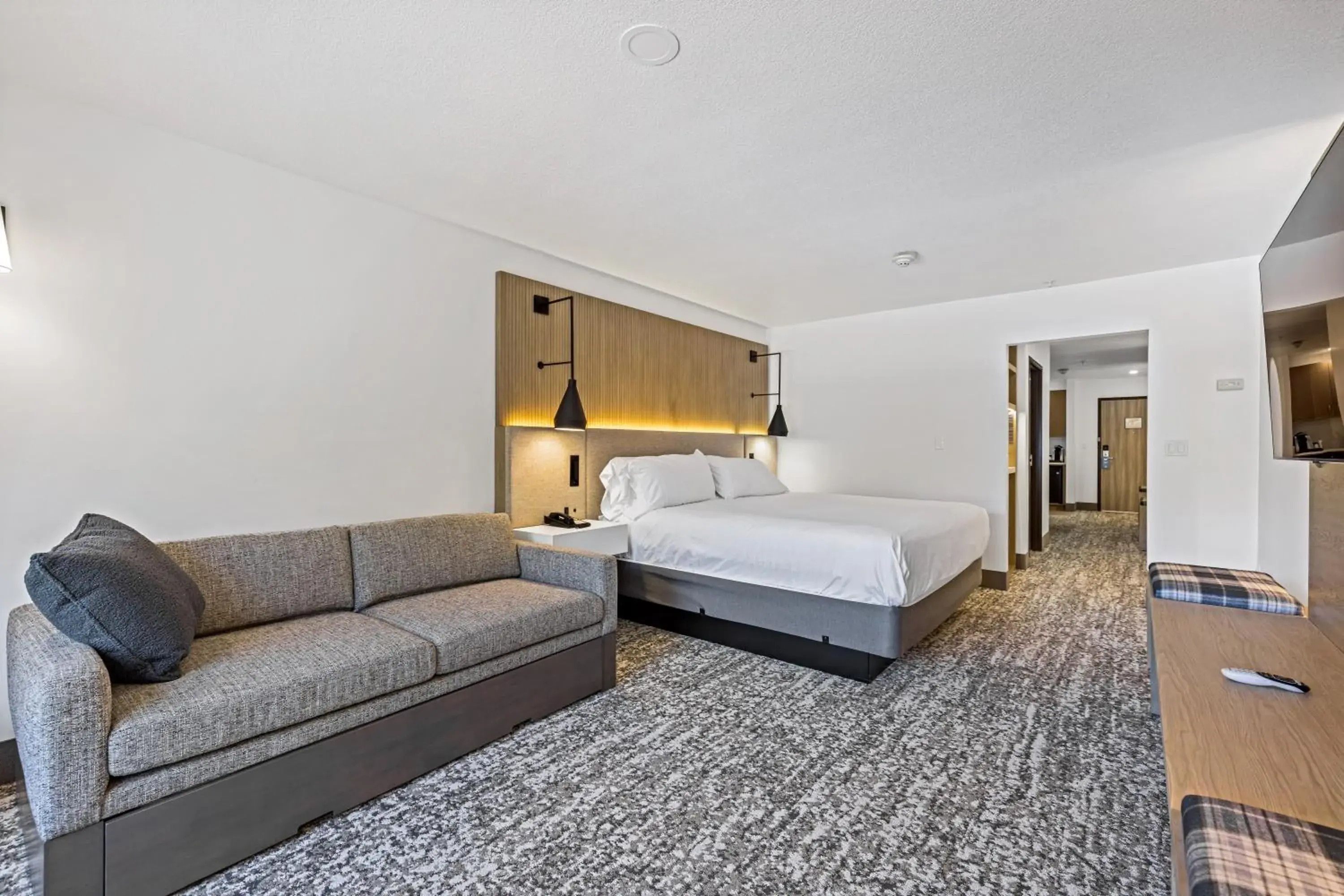 Seating area, Bed in The Evergreen Hotel Seating area, Bed in The Evergreen Hotel