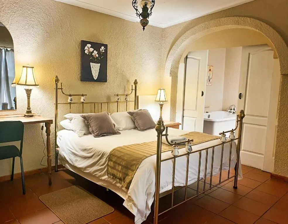 Bed in Just Tiffany Guest House & Conference Facility