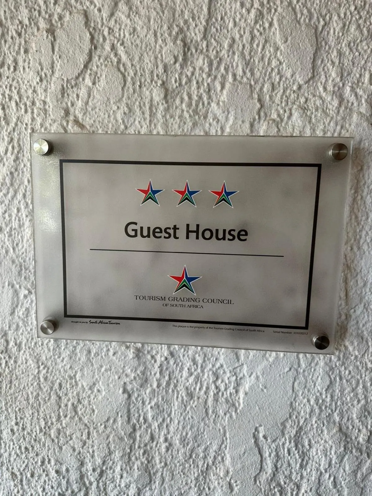 Property logo or sign in Just Tiffany Guest House & Conference Facility