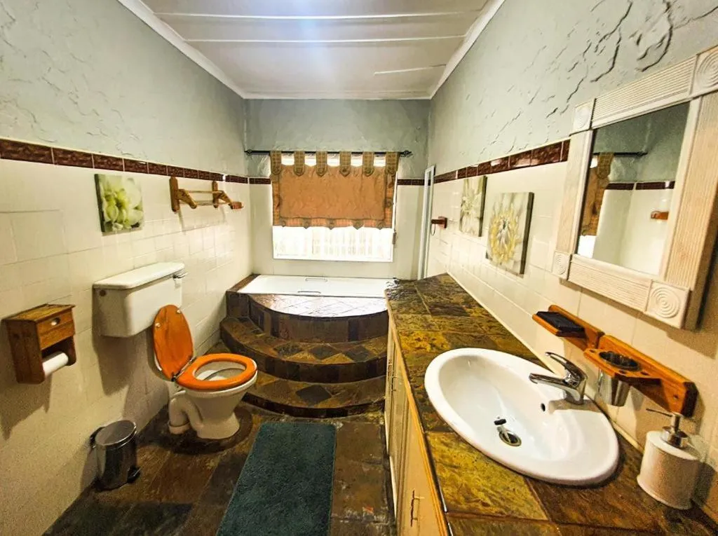 Toilet in Just Tiffany Guest House & Conference Facility