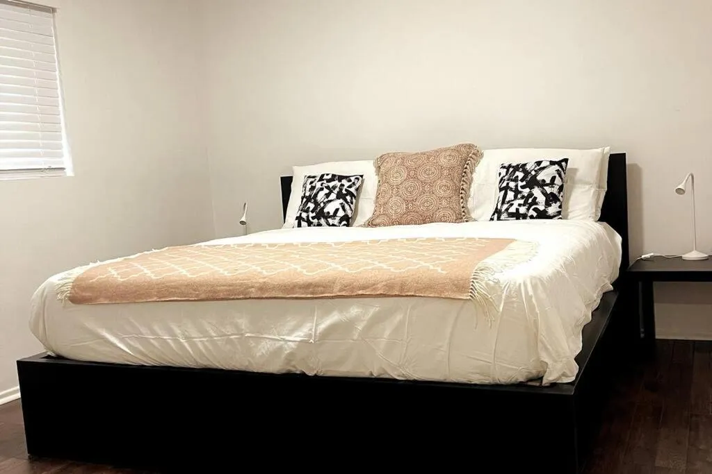 Bed in Hollywood Business Apartments