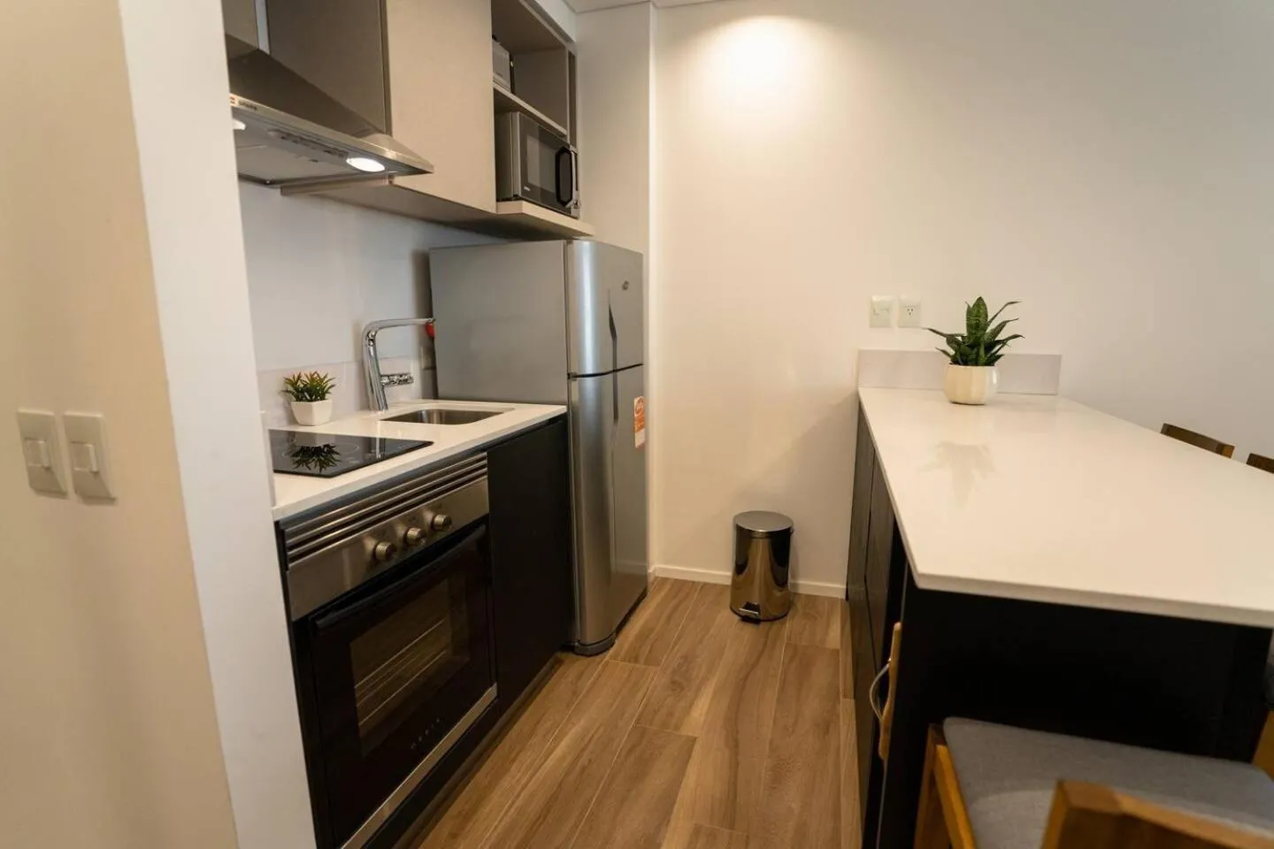 kitchen in Barrancas Quality Apartments