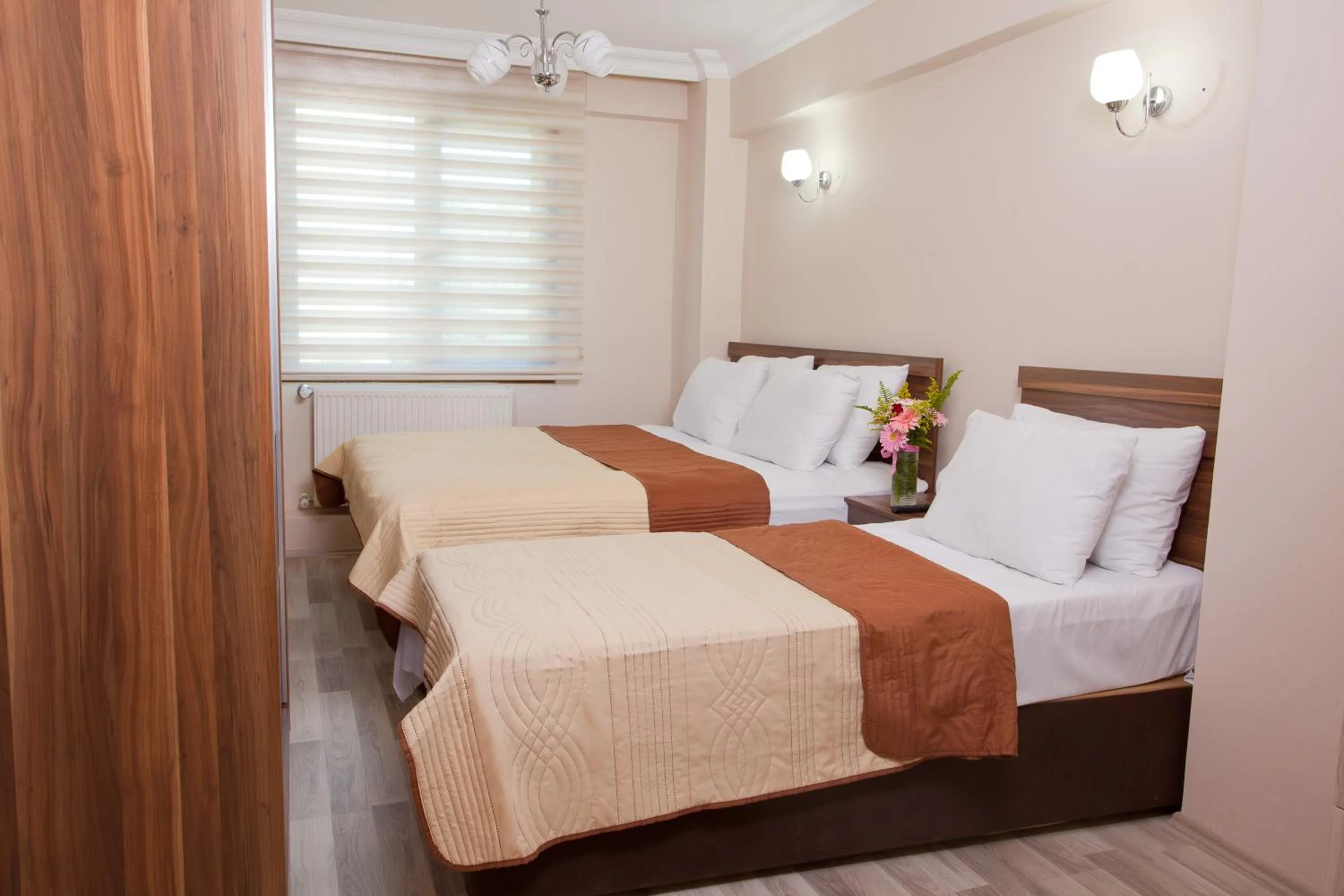 Bed in Birlik Apart Hotel