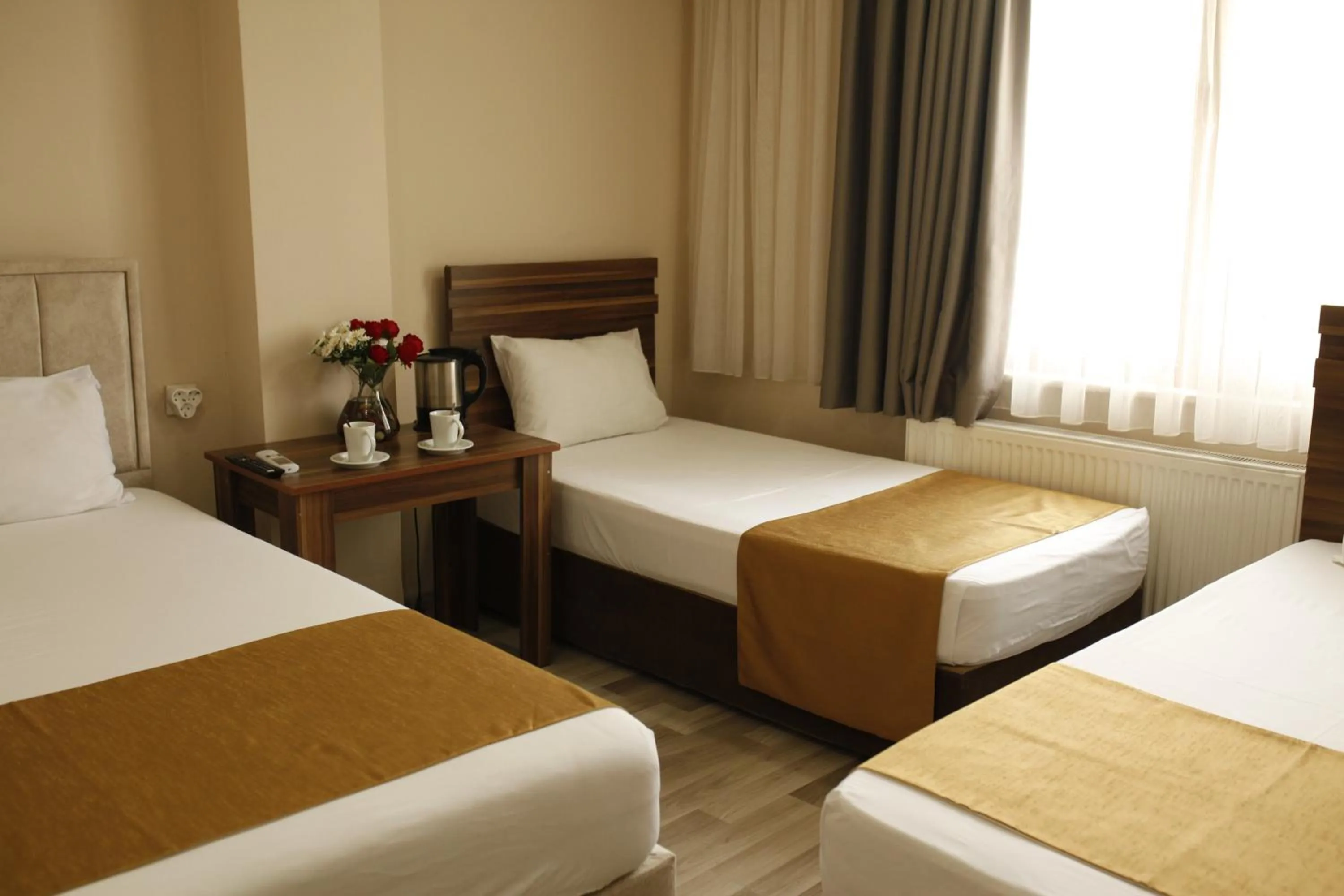 Bed in Birlik Apart Hotel