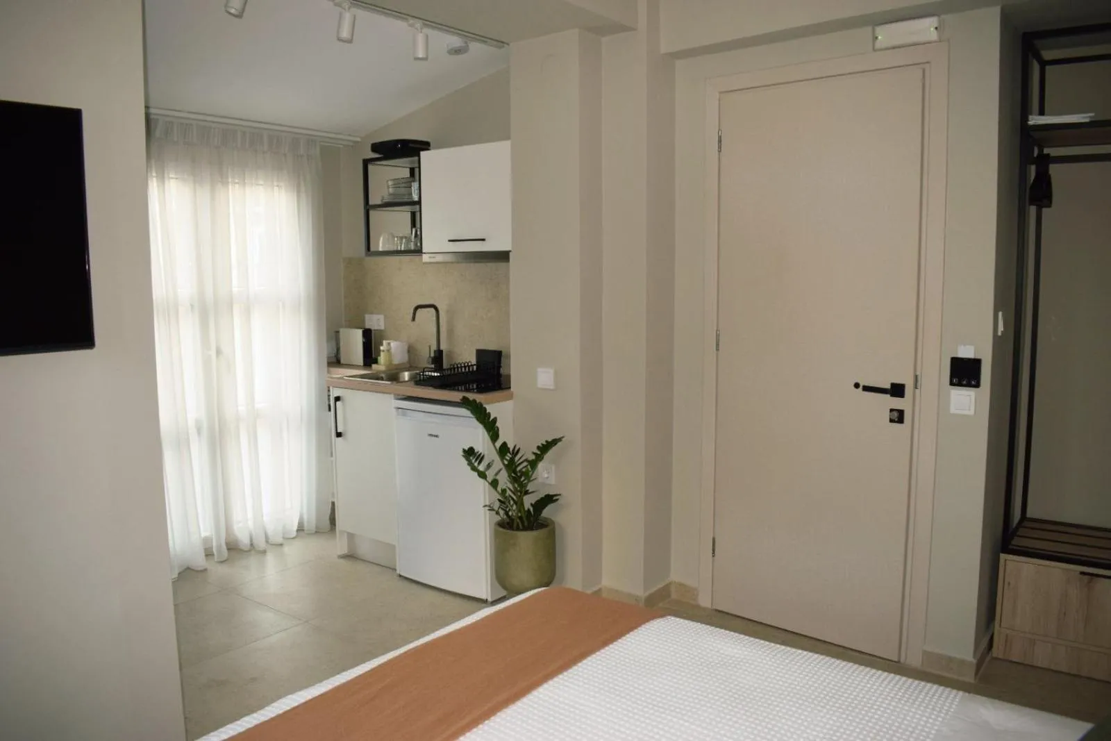 Bed in Limeria studios & maisonettes