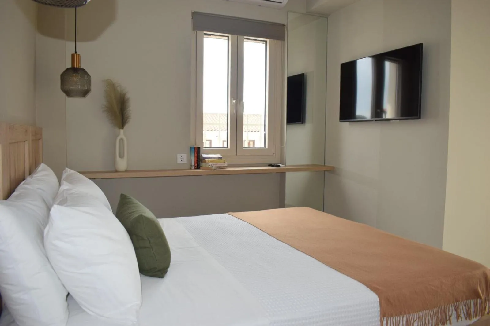 Bed in Limeria studios & maisonettes