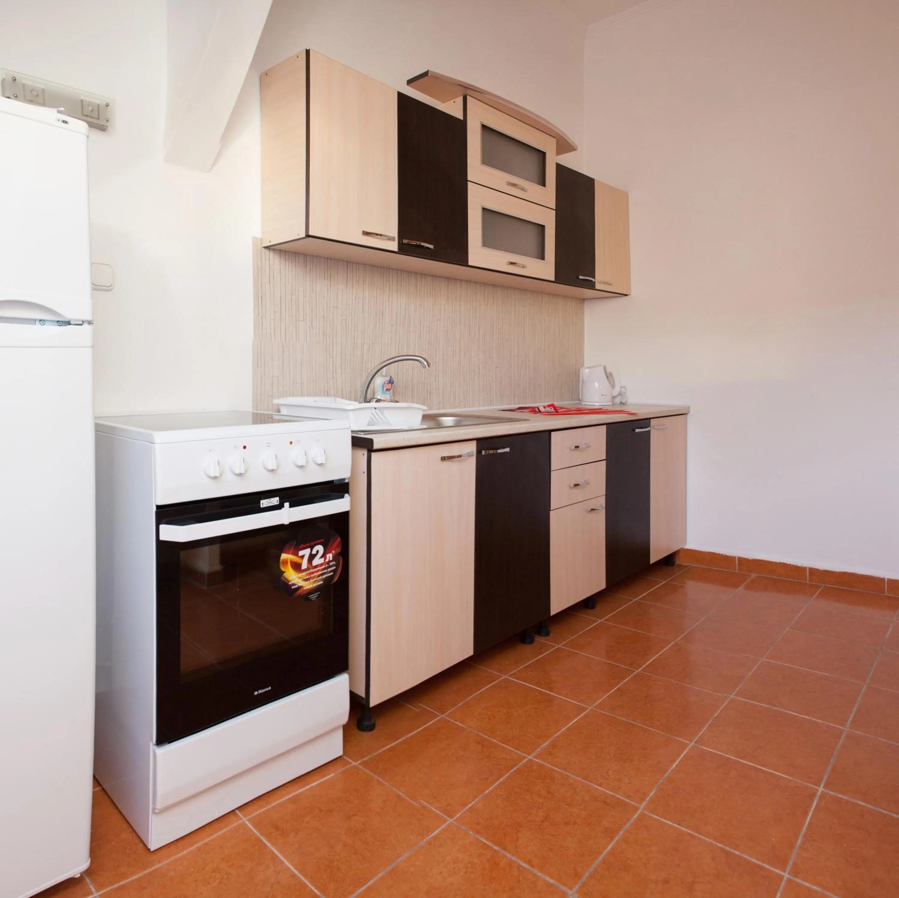 Kitchen or kitchenette in Premier Apartment