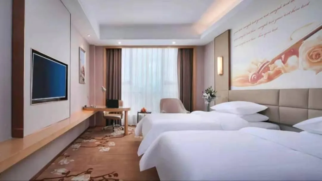 Bed in Vienna International Hotel Nanchang Qingshan Lake Wanda Plaza