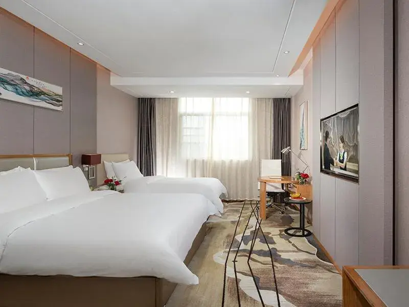 Bed in Vienna International Hotel Ganzhou Longnan Bed in Vienna International Hotel Ganzhou Longnan