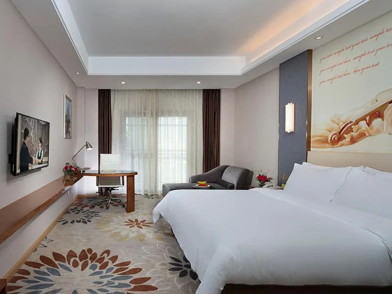 Bed in Vienna International Hotel Ganzhou Longnan