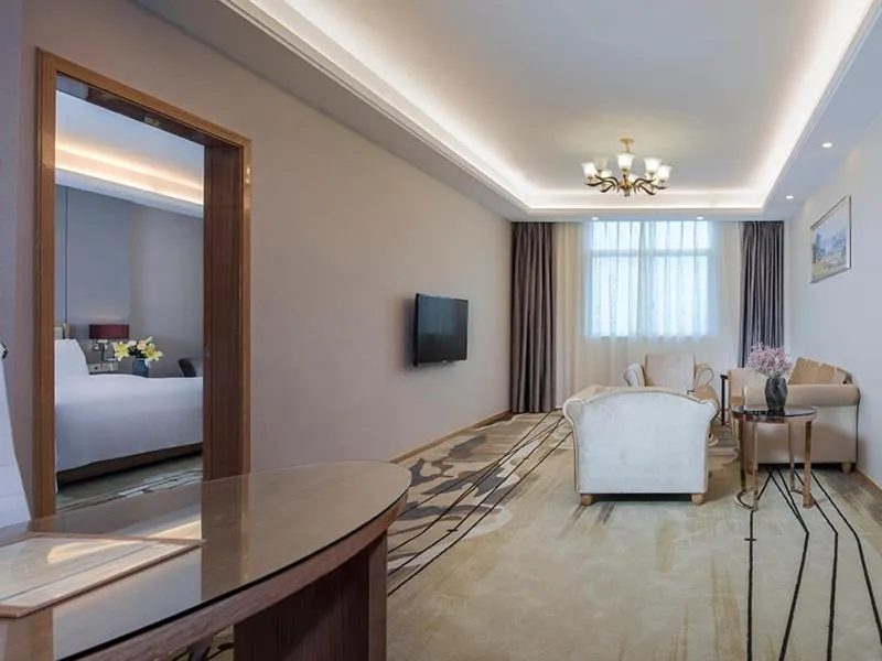 Bed in Vienna International Hotel Ganzhou Longnan