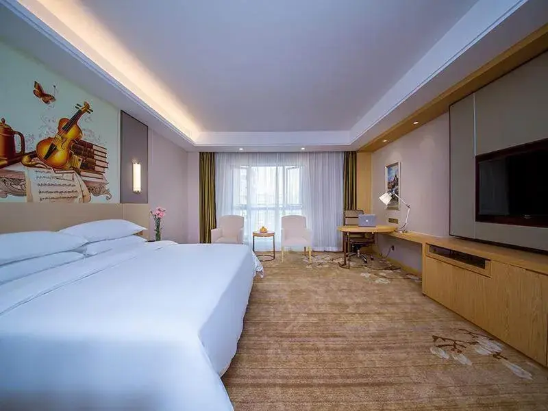 Bed in Vienna International Hotel Yichang Gezhouba Sanxia Culture Tiandi Bed in Vienna International Hotel Yichang Gezhouba Sanxia Culture Tiandi