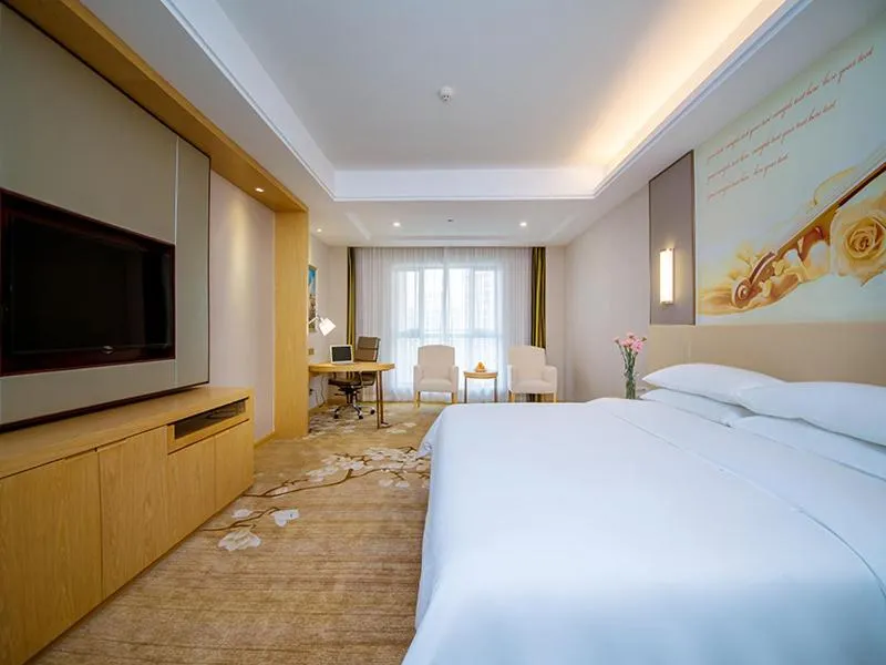 Bed in Vienna International Hotel Yichang Gezhouba Sanxia Culture Tiandi