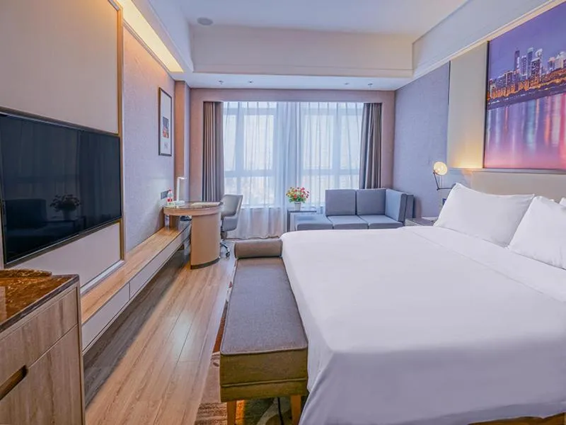 Bed in Vienna International Hotel Chongqing Ranjiaba