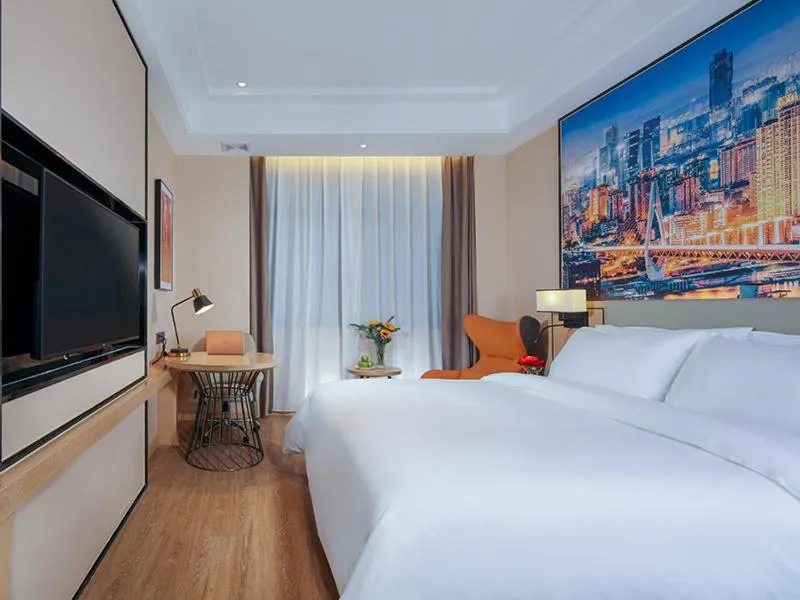 Bed in Vienna International Hotel Chongqing North Station