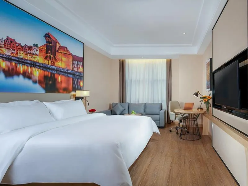 Bed in Vienna International Hotel Chongqing North Station