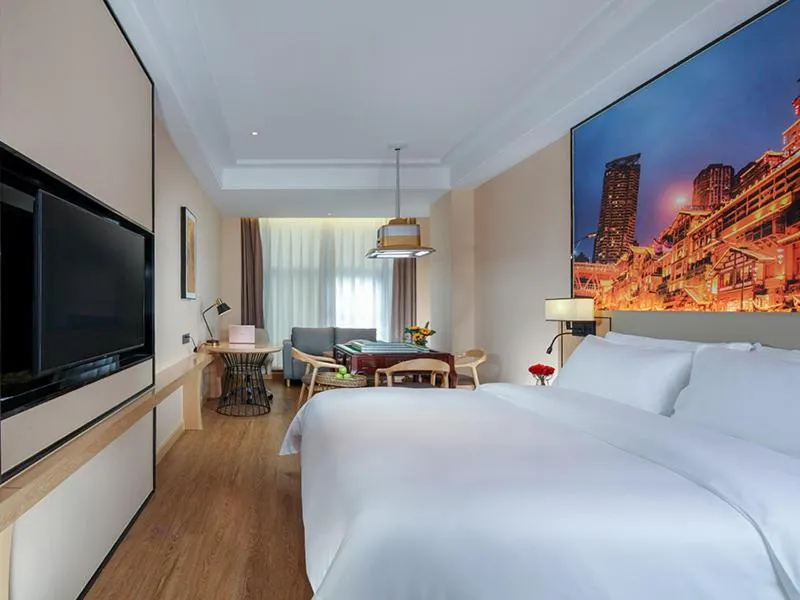 Bed in Vienna International Hotel Chongqing North Station