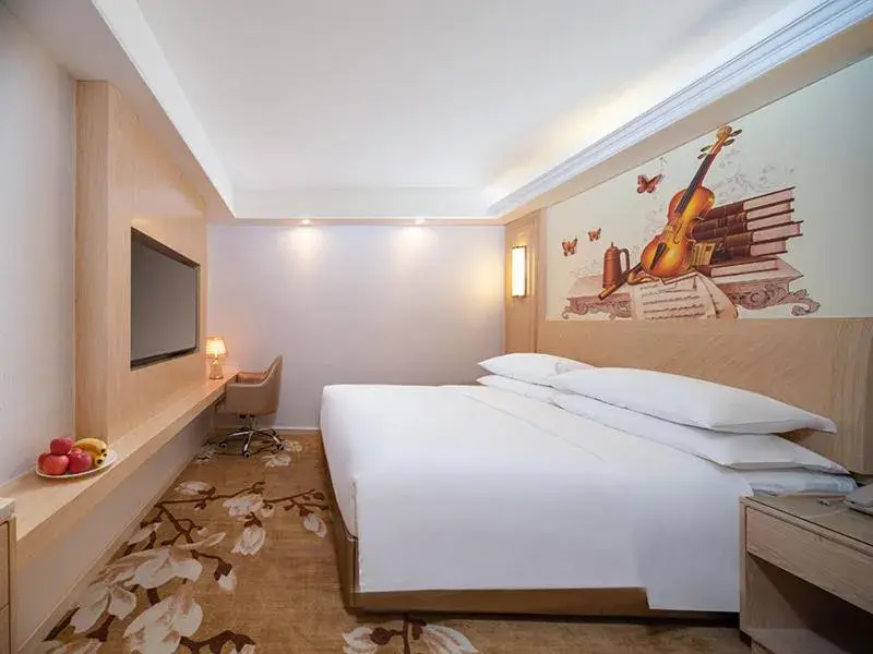 Bed in Vienna International Hotel Chongqing Yuanyangyuanboyuan Bed in Vienna International Hotel Chongqing Yuanyangyuanboyuan