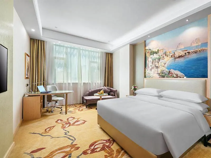 Bed in Vienna International Hotel Zhejiang Wenzhou Ruian Tangxia
