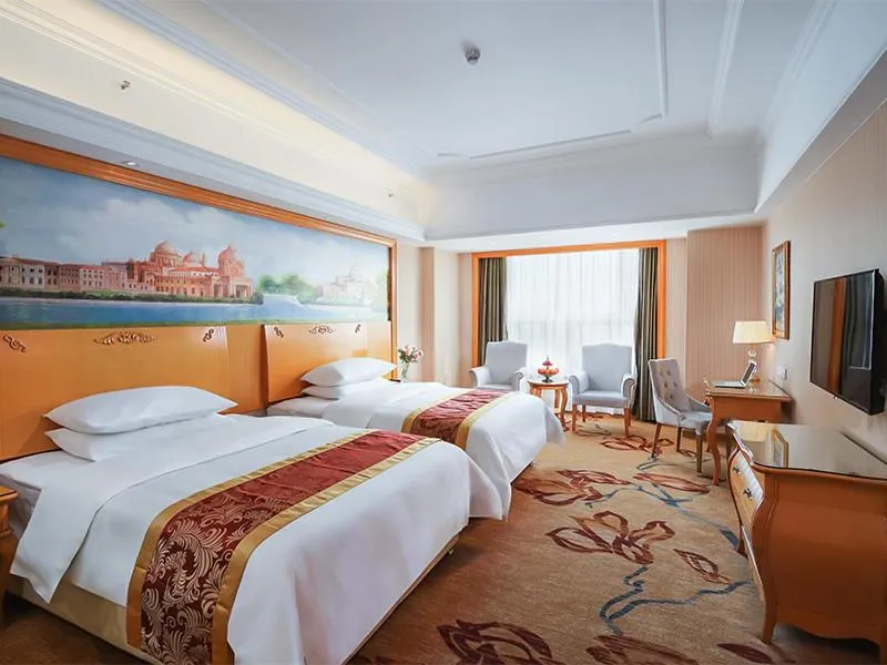 Bed in Vienna International Hotel Wuxi Huishan Yanqiao Metro Station