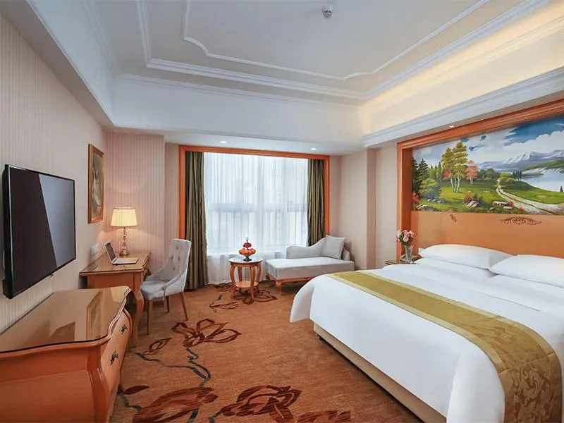 Bed in Vienna International Hotel Wuxi Huishan Yanqiao Metro Station