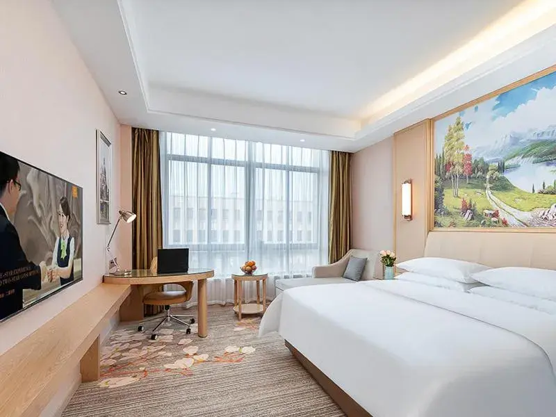 Bed in Vienna Hotel Danyang Glasses City High Speed Railway Station Dabo Bed in Vienna Hotel Danyang Glasses City High Speed Railway Station Dabo