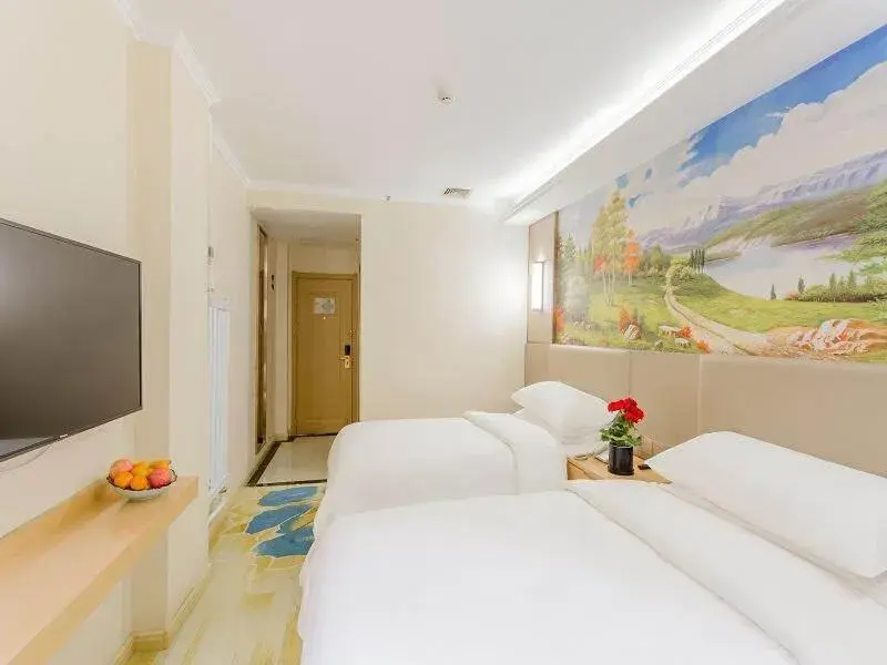 Bed in Vienna Classic Hotel Mudanjiang Railway Station Bed in Vienna Classic Hotel Mudanjiang Railway Station