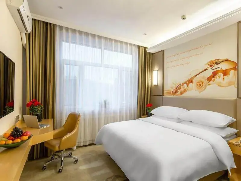 Bed in Vienna Classic Hotel Mudanjiang Railway Station Bed in Vienna Classic Hotel Mudanjiang Railway Station