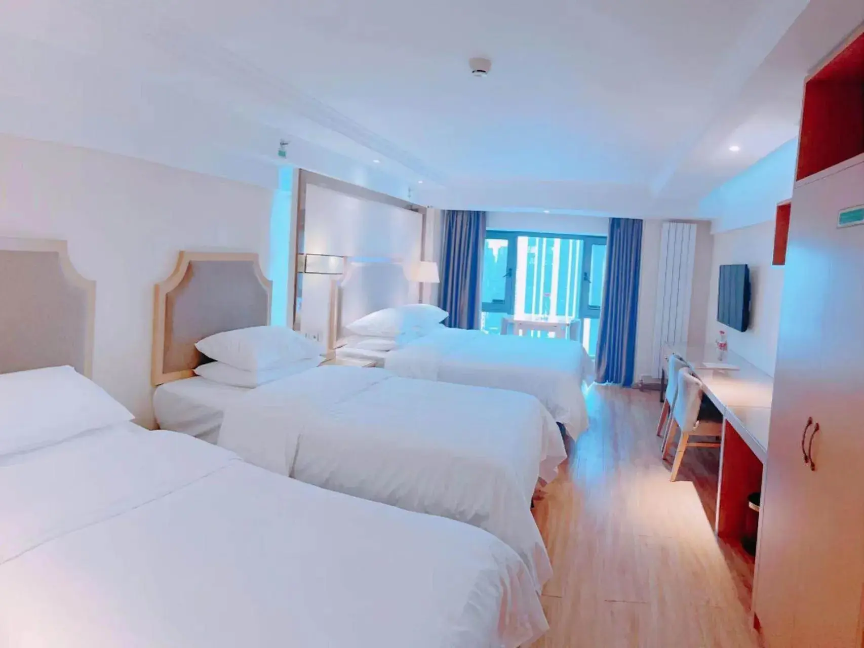 Bed in Vienna Hotel Harbin West Railway Station Wanda Plaza Bed in Vienna Hotel Harbin West Railway Station Wanda Plaza