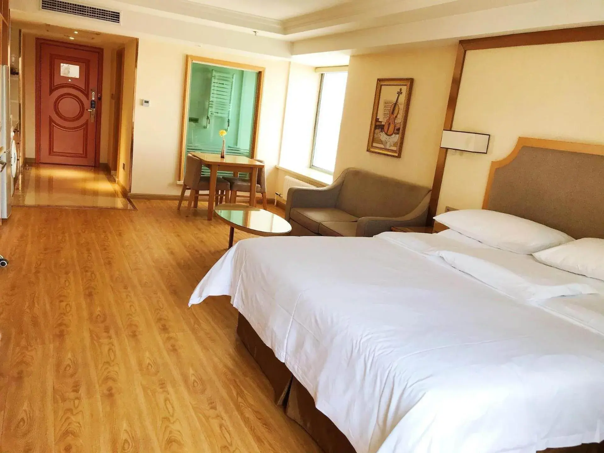 Bed in Vienna Hotel Harbin West Railway Station Wanda Plaza Bed in Vienna Hotel Harbin West Railway Station Wanda Plaza