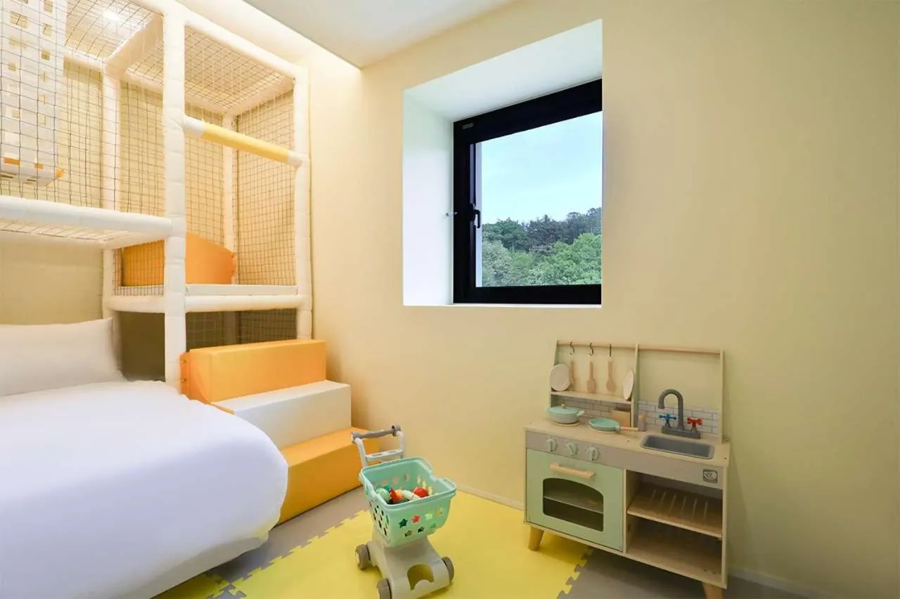 Bed in Doan Kids Hotel Yangsan