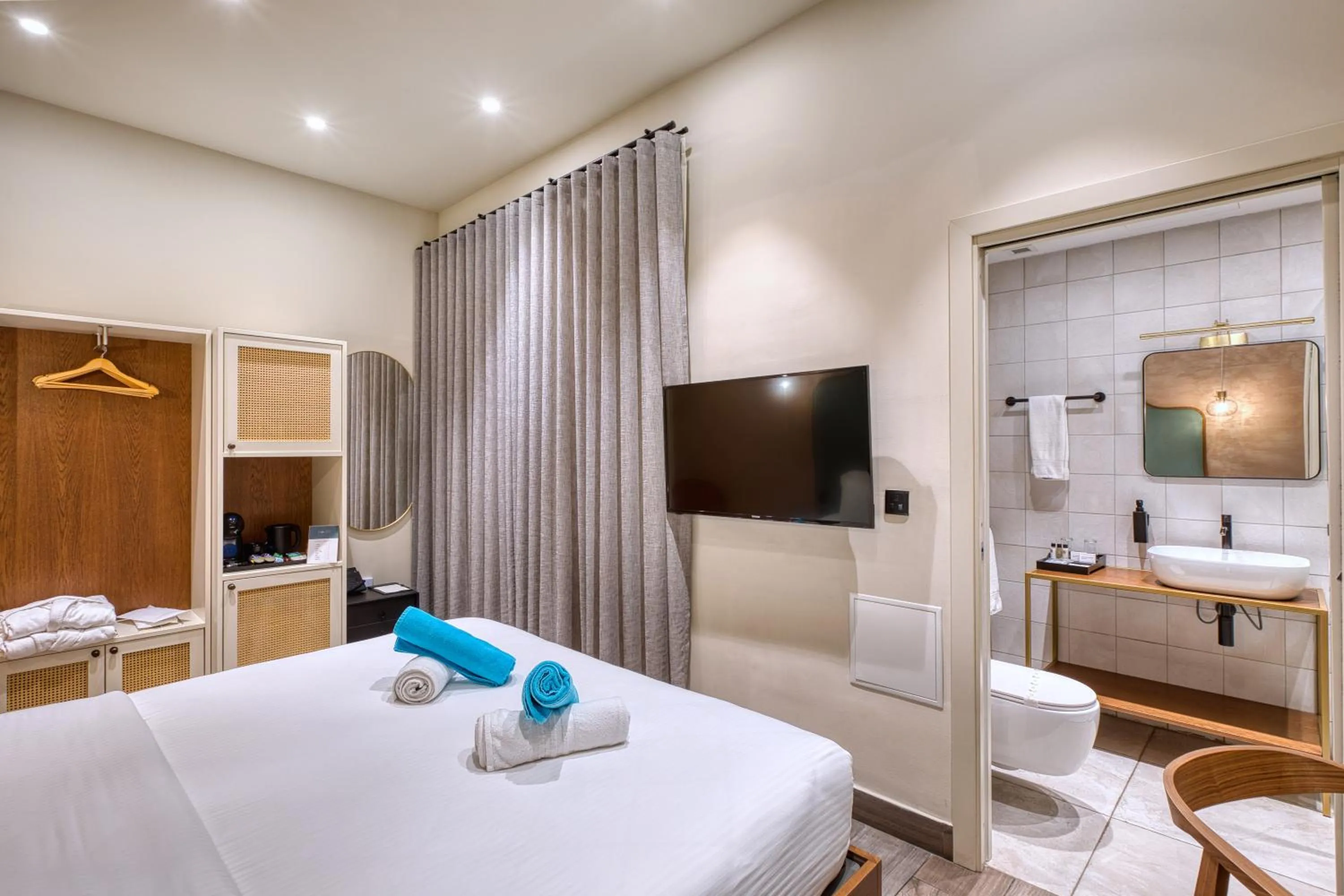 Photo of the whole room, Bed in DOMS Boutique Living