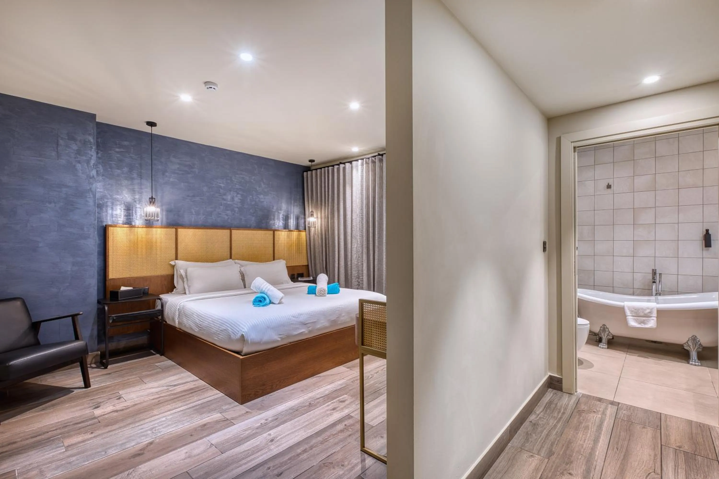 Photo of the whole room, Bed in DOMS Boutique Living